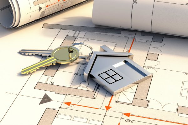 house-keys-and-construction-blueprint-plans-residential-development-project-3d-illustration.jpg